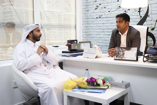 Ameer Ali with Mr. Mohamed Hassan Al-Nuaimi