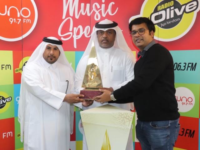Qatar Cup  Representative Handing Over Qatar Cup Trophy to Radio Suno Managing Director Ameer Ali Paruvally